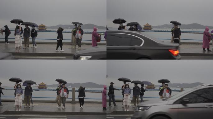 青岛栈桥雨天行人街道