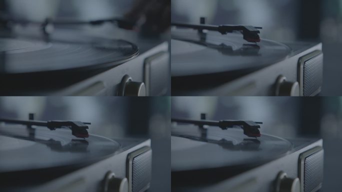 高端意境黑胶唱片用手播放音乐