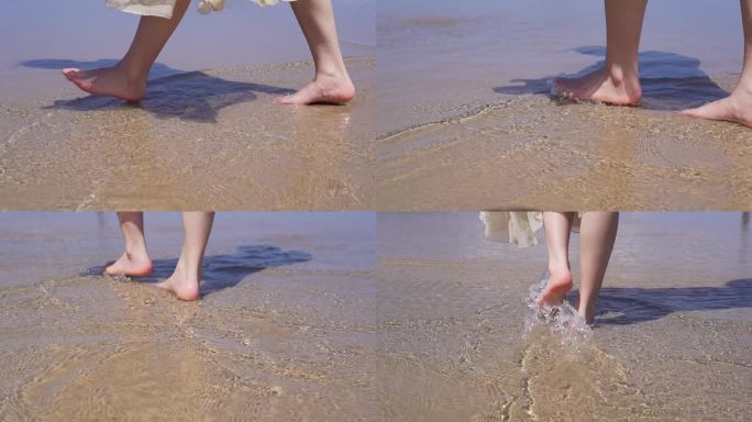 人物海边脚踩水花慢镜头特写