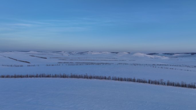 航拍4K东北雪色原野暮色