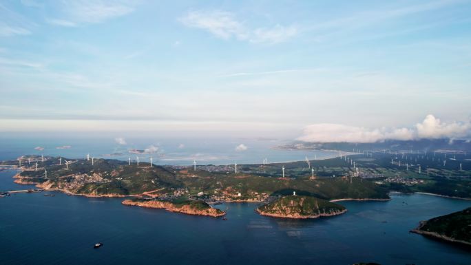 航拍环绕海岛风力发电机田