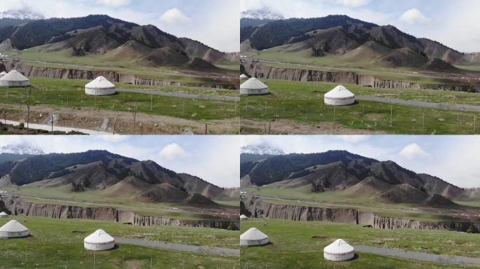 航拍起飞 新疆的蒙古包与高山牧场