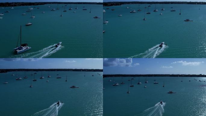 【4K航拍】平静大海上停放着帆船-冲浪人