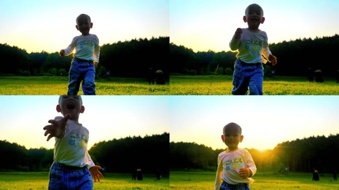 小孩草地上快乐奔跑可爱小男孩追着镜头奔跑