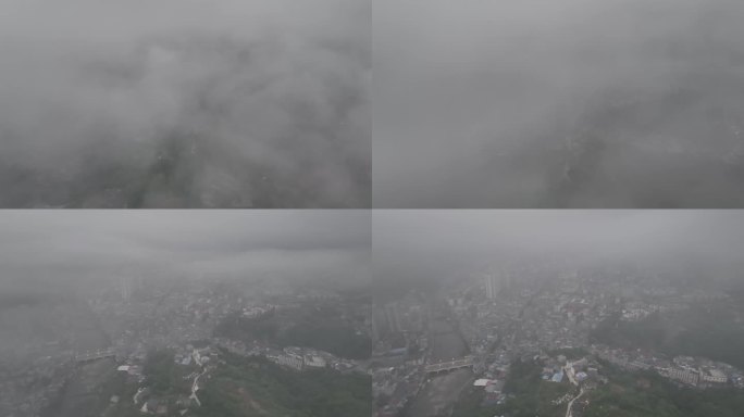 穿过厚厚的云雾层看到城市全景