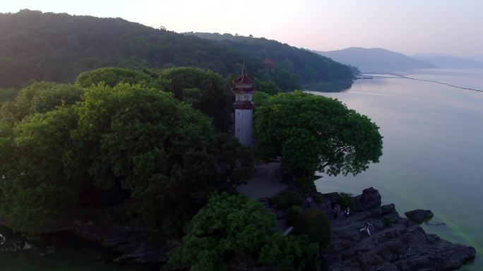航拍无锡太湖仙岛清晨日出鼋头灯塔
