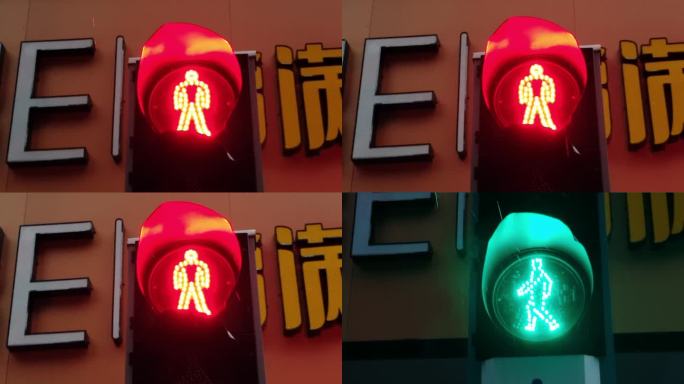 雨中信号灯雨季雨水路口道路交通红绿灯转换