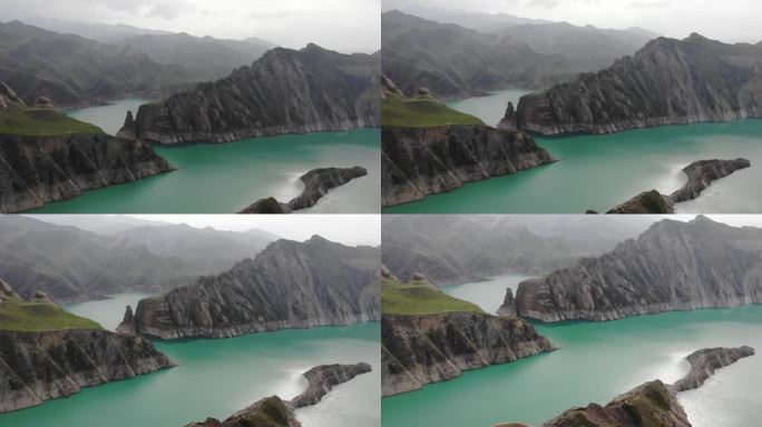 航拍新疆肯斯瓦特水库与群山
