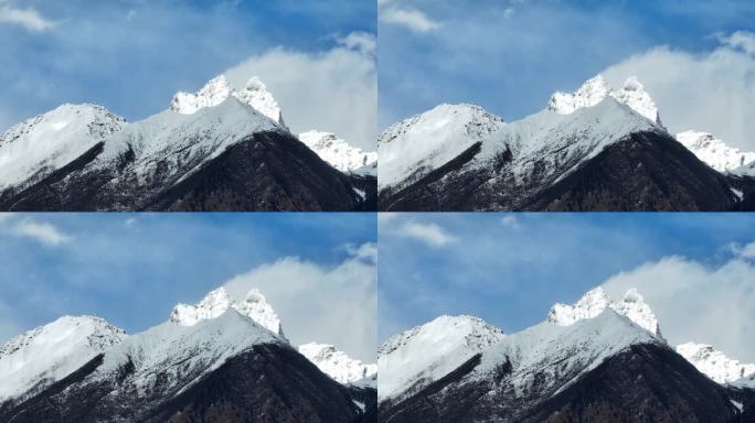 蓝天白云下的西藏林芝雪山风光