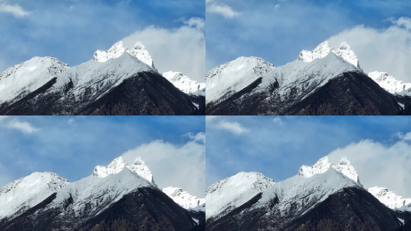 蓝天白云下的西藏林芝雪山风光