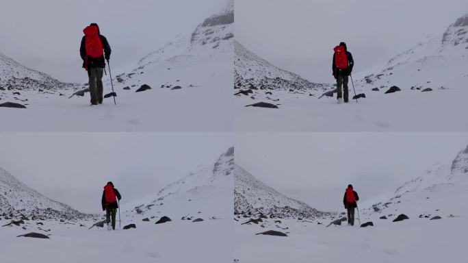 攀登岷山山脉主峰雪宝顶的登山者徒步进山