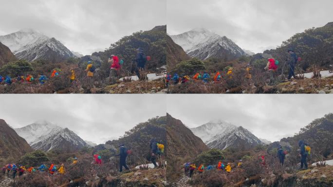 四川甘孜攀登那玛峰的登山者徒步进山