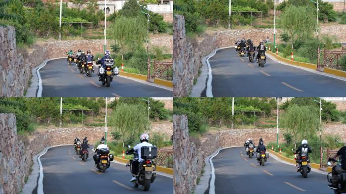 摩托车队行驶在乡村道路