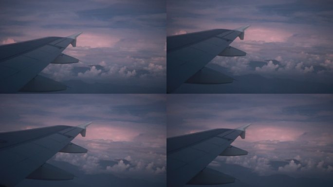 飞机飞行中，风暴前天空闪雷，氛围感情绪感