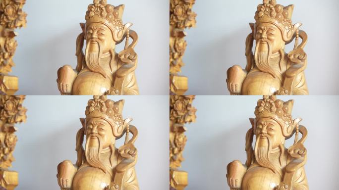 传统木雕作品财神菩萨实拍原素材