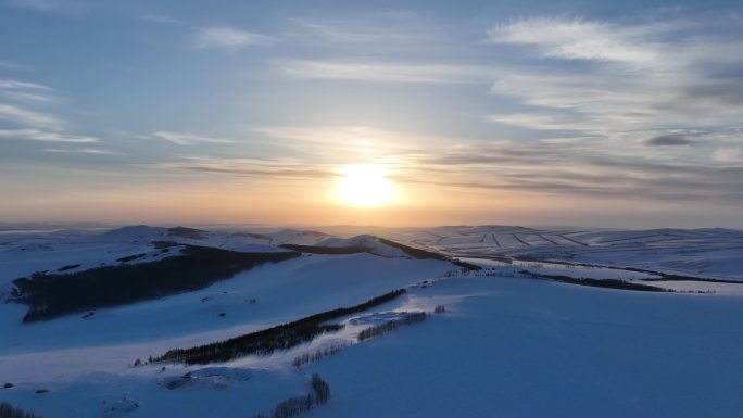 航拍高寒山地雪野日落