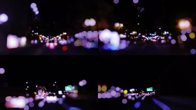 城市夜晚的光斑霓虹灯