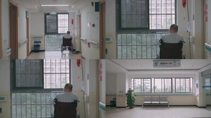 病人坐着轮椅在医院走廊