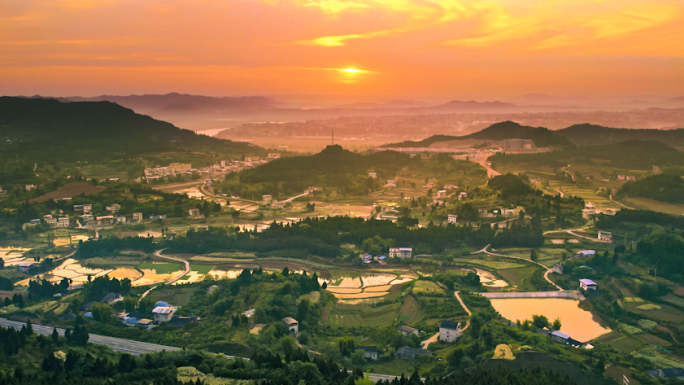 航拍四川盆地清晨霞光田园