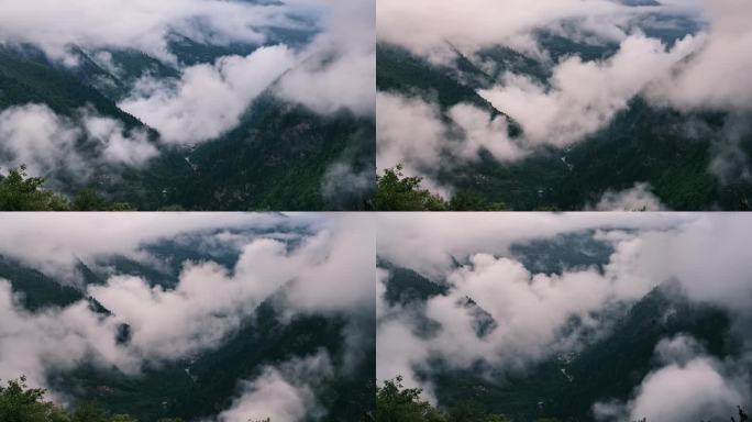 山林间云雾笼罩风云变幻的山谷和村落延时