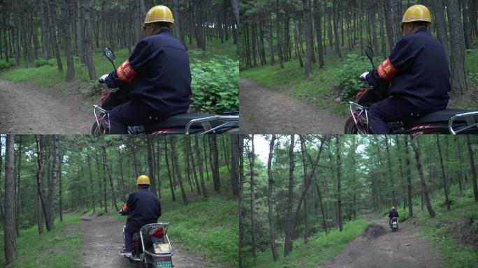 在森林中骑摩托巡防的护林员