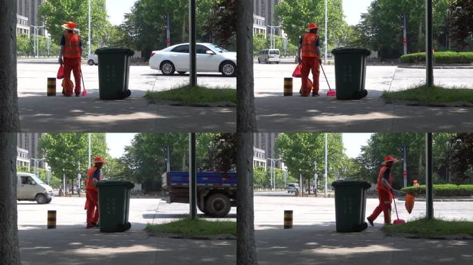 环卫工人在马路边扫 垃圾