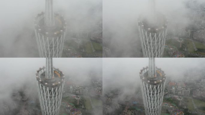 航拍云雾中的广州塔摩天轮