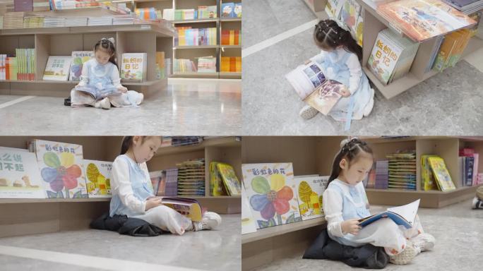 小女孩在图书馆地板上认真看书学习阅读
