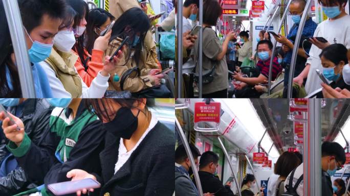 城市乘坐地铁玩手机的年轻人40