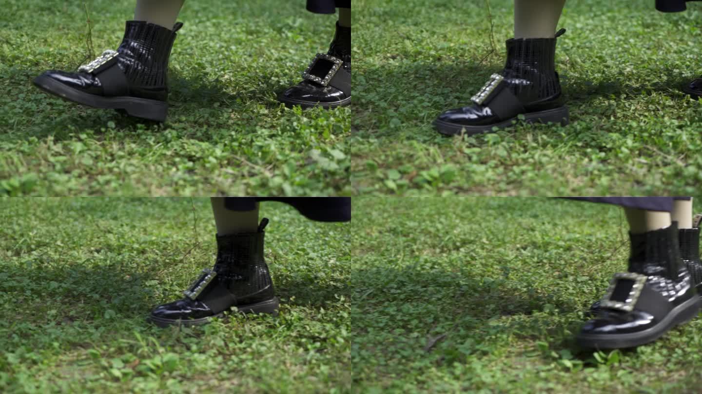 慢镜头  特写  黑色皮鞋走在草地