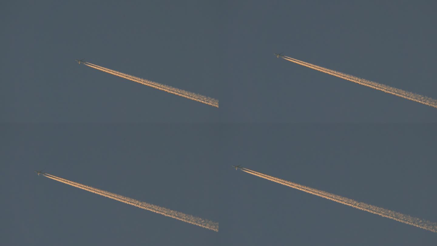 喷气式飞机高空蓝天巡航飞行凝结金色航迹云