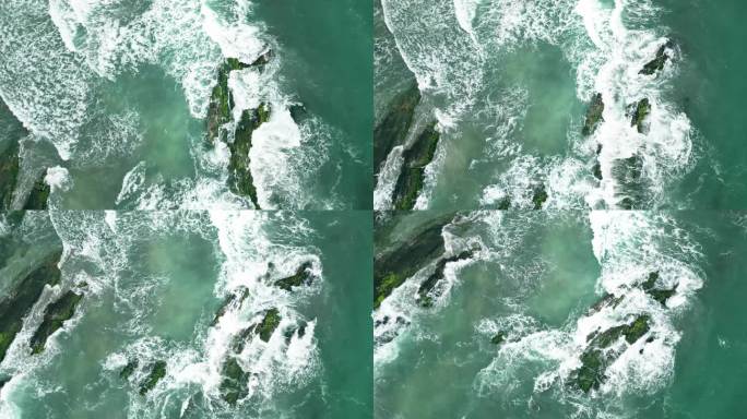 慢镜头航拍海中礁石旋转上升镜头4K
