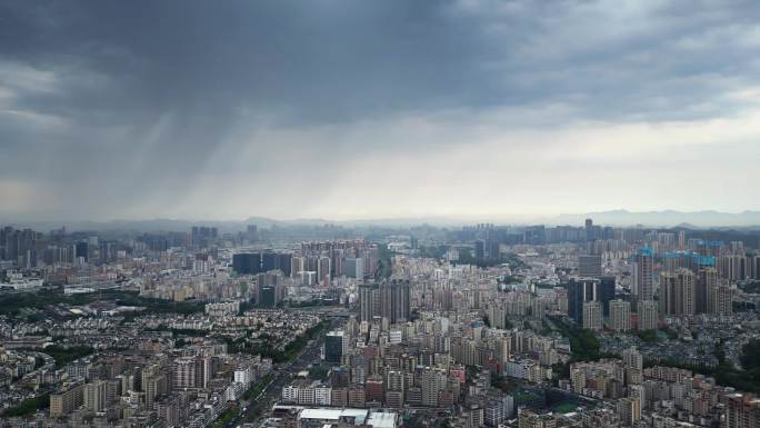 航拍远处下雨过程