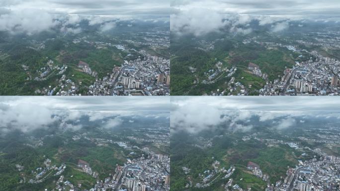 城市高空飞向远方云层4K