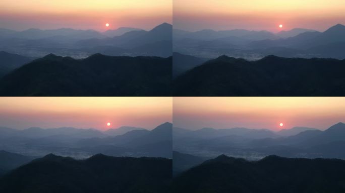 重峦叠嶂的山间日落航拍4K
