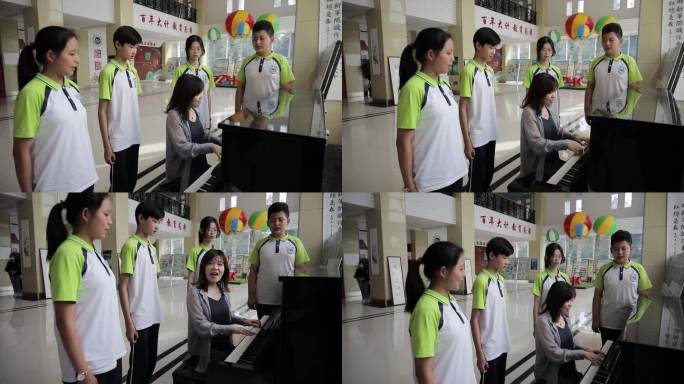 音乐老师弹琴教学生唱歌