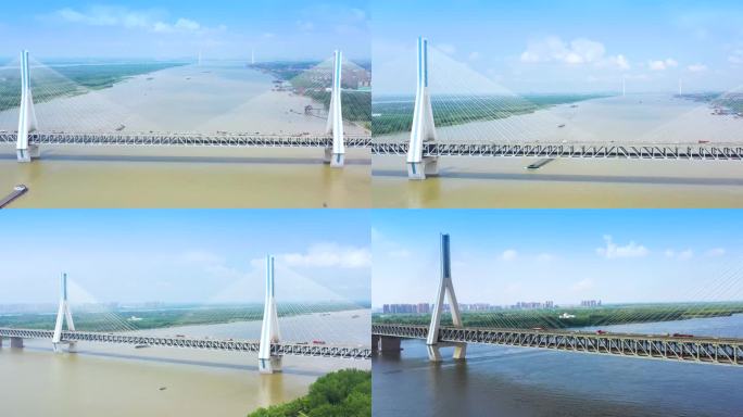 航拍大气武汉长江大桥和谐号电力机车穿行