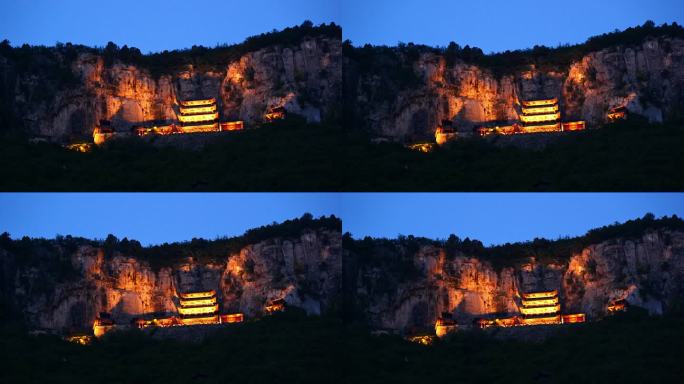 傍晚时分亮灯的山顶女娲娘娘寺庙