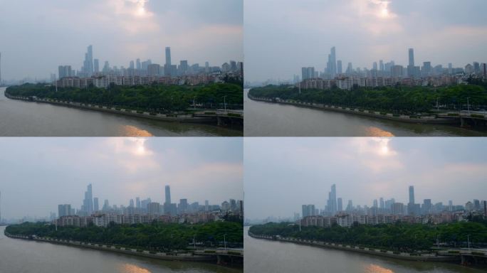 广州珠江边琶洲桥上远眺珠江新城东西塔落日