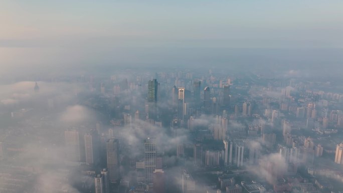 航拍日出平流雾下的南京新街口