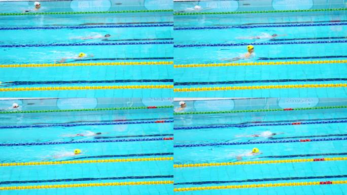 实拍水立方国家游泳中心男子蛙泳比赛的男孩