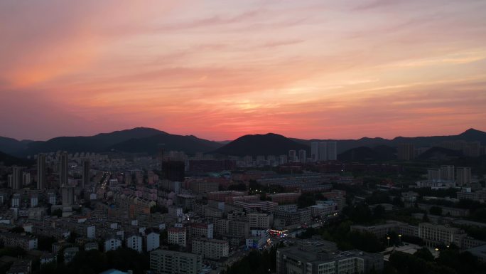 航拍延迟4K大连夕阳大连理工大学陵水落日