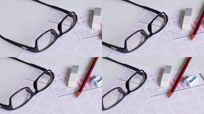 高考考场课桌上的眼镜和答题卡
