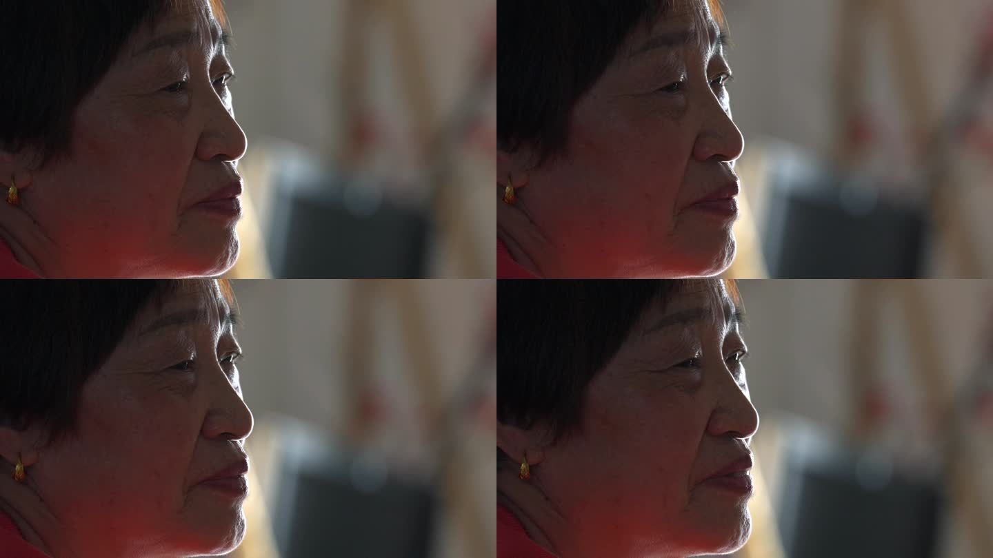 4K升格实拍亚裔老年女性面部特写镜头