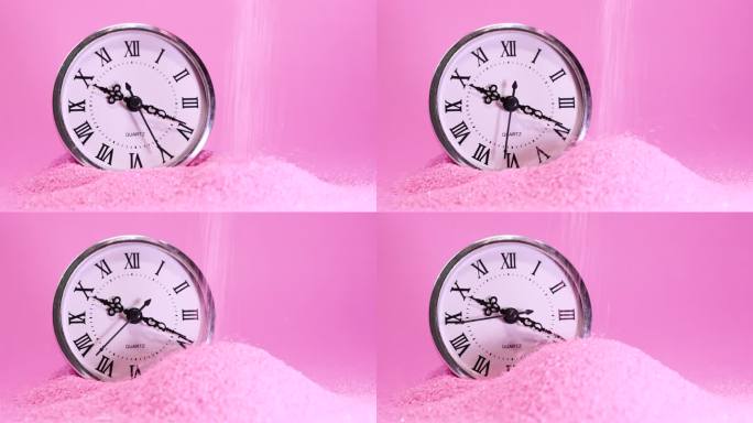 粉色沙子上的钟表