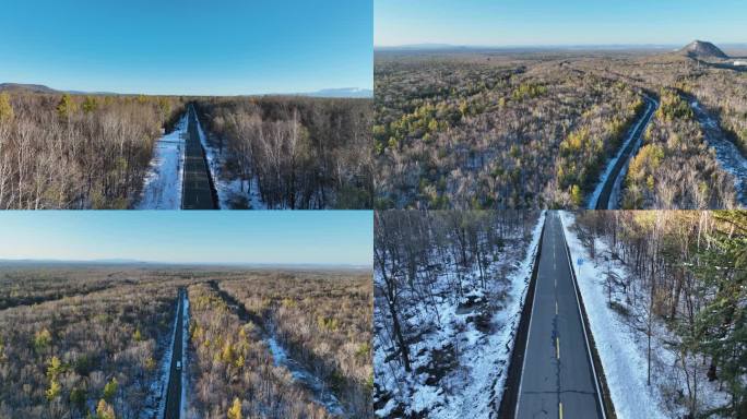 航拍长白山脚下森林公路积雪林海雪原美景