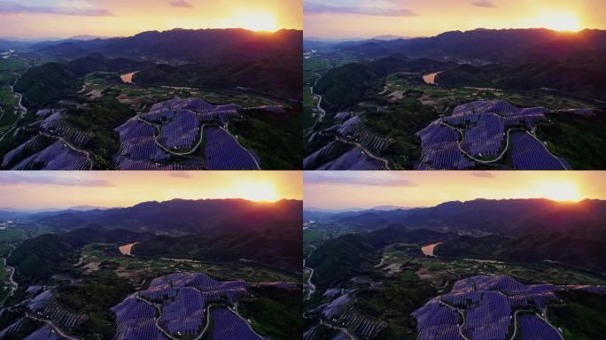 霞光中的群山光伏太阳能电池板