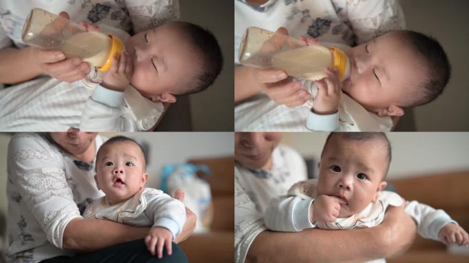 婴儿喝奶迷迷糊糊拍嗝视频