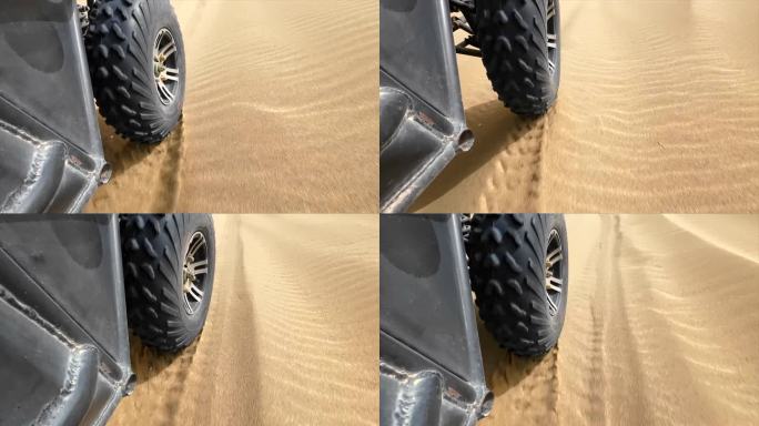 越野车轮在沙漠中行驶