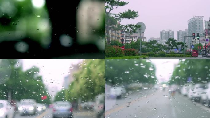 车窗上的雨滴下雨天车外街景